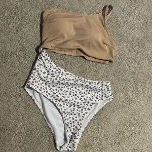 Tan and white one piece cut one shoulder cut out swimsuit